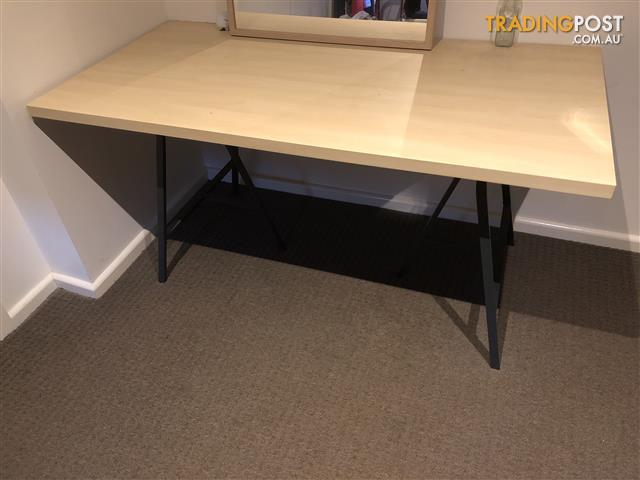 desk with mirror attached