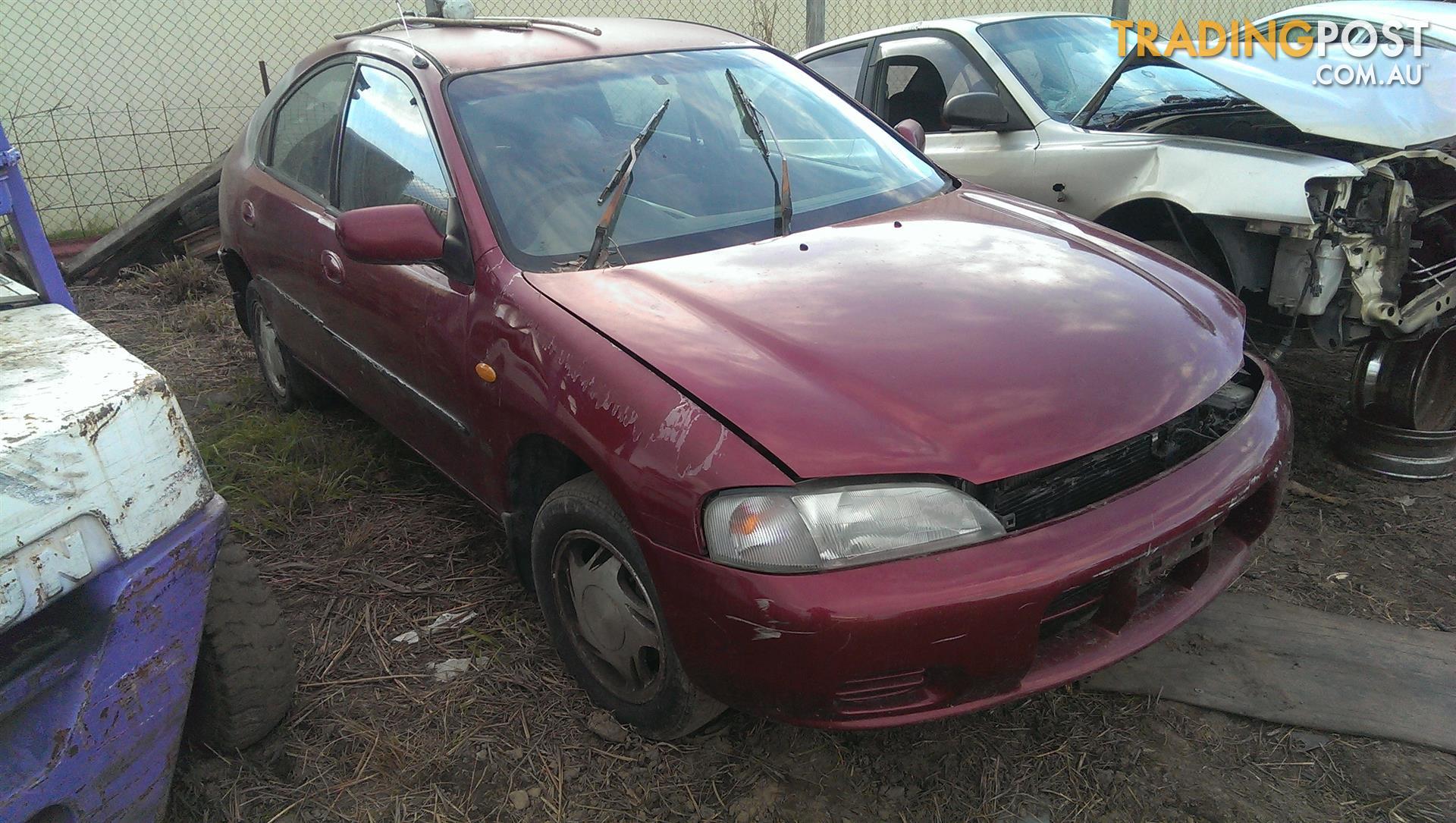 10/94 Ford Laser KJ2 4Dr Hatch Manual 1.8 Petrol DOOR RF