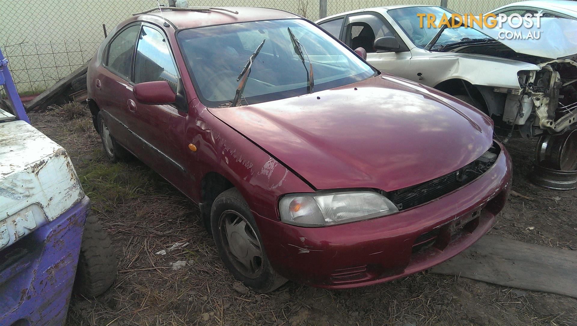 10/94 Ford Laser KJ2 4Dr Hatch Manual 1.8 Petrol RIGHT TAIL LIGHT