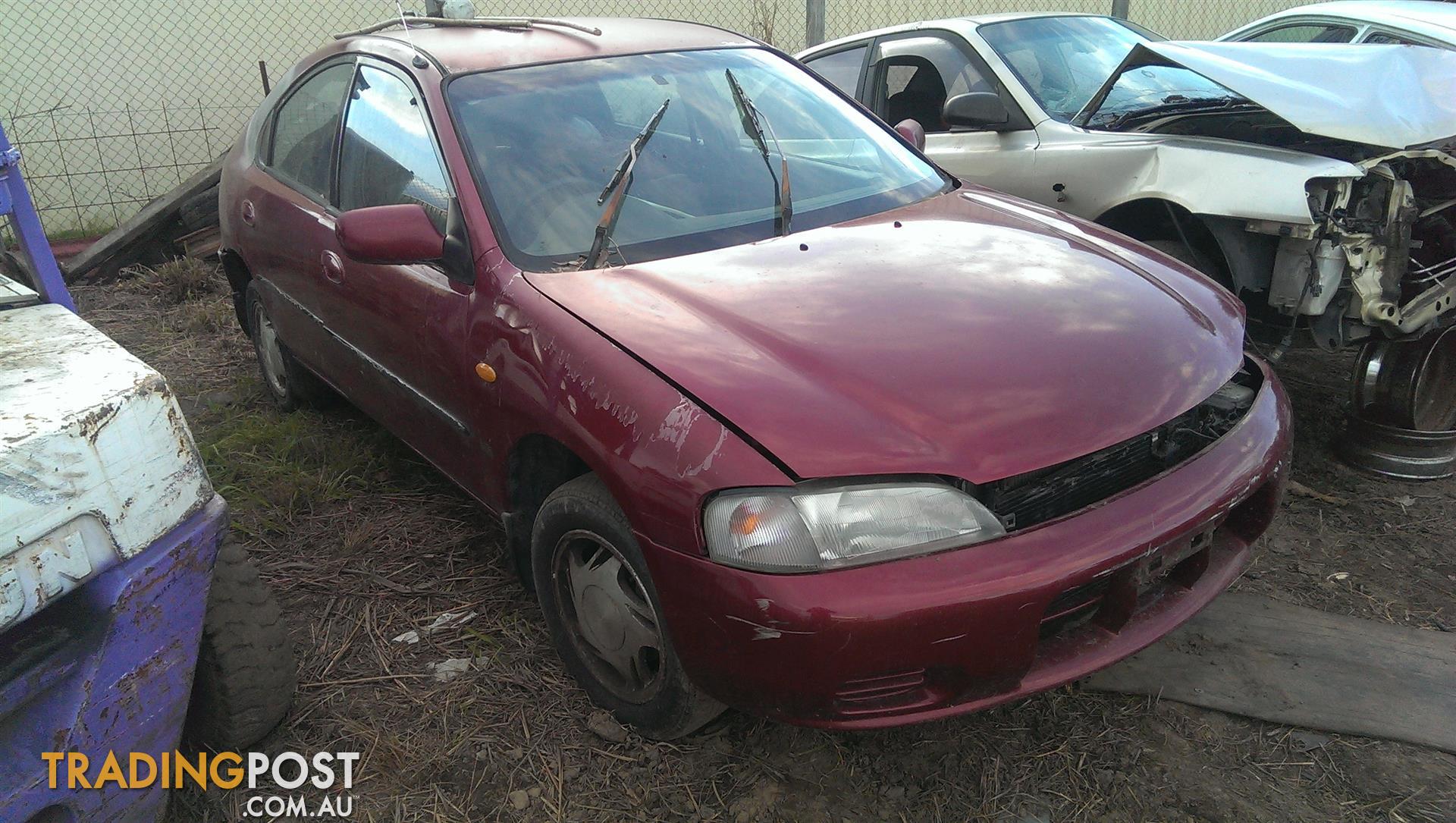 10/94 Ford Laser KJ2 4Dr Hatch Manual 1.8 Petrol RIGHT REAR DOOR TRIM