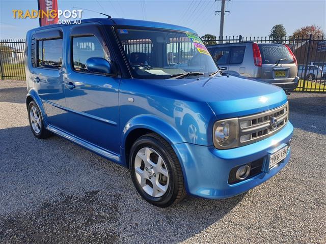 Nissan cube 2004 год