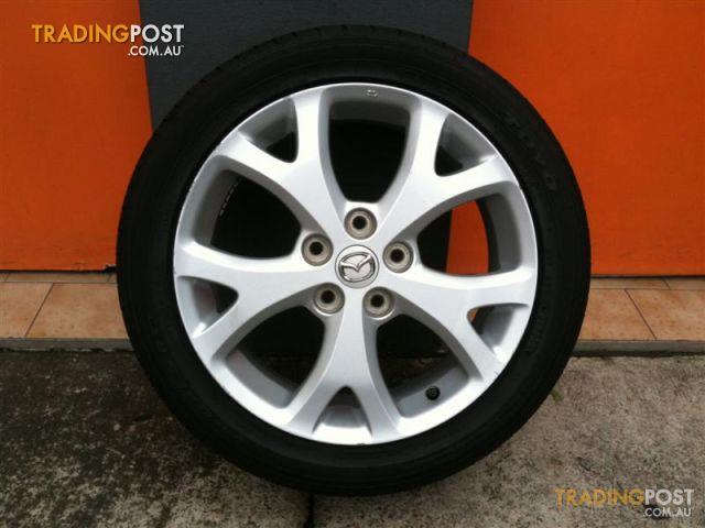 MAZDA SP23 SRS 2 SNOWFLAKE 17 INCH GENUINE ALLOY WHEELS