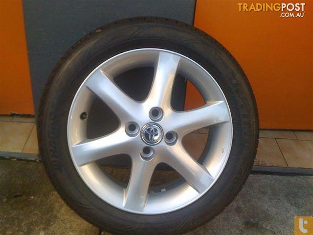 TOYOTA COROLLA CONQUEST 15 INCH GENUINE ALLOY WHEELS 