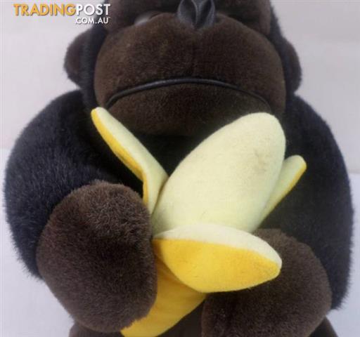 monkey holding banana stuffed animal