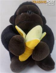 monkey holding banana stuffed animal