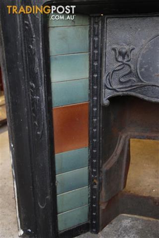 Cast Iron Fireplace With Aqua Tiles