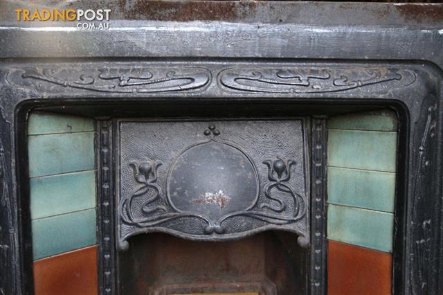 Cast Iron Fireplace With Aqua Tiles