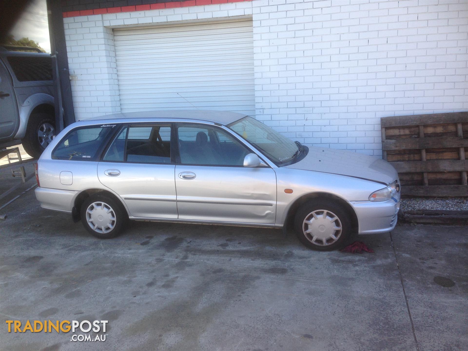 2003 Mitsubishi Lancer CE Wagon manual 1.8 GRILLE A1006