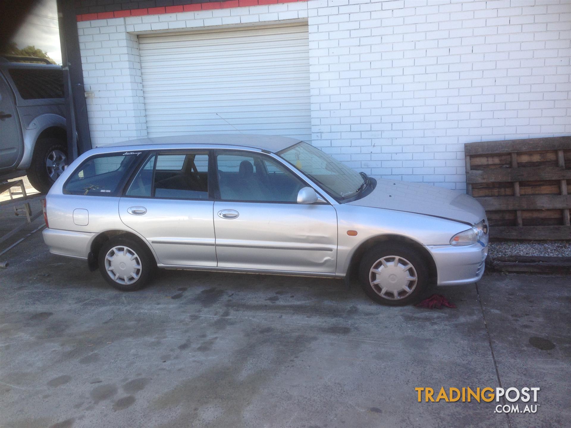 2003 Mitsubishi Lancer CE Wagon manual 1.8 LEFT GUARD A1006